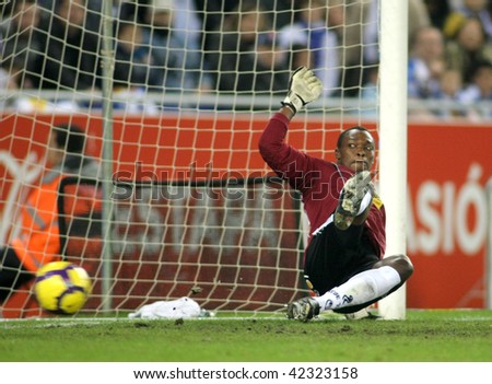 BARCELONA - DEC. 6: Cameroonian goalkeeper Kameni of RCD Esapnyol fails to stop the ball during a Spanish League match against Santander at the Estadi Cornella on December 6, 2009 in Barcelona.