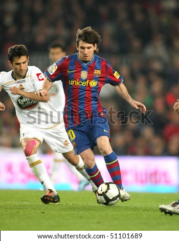 BARCELONA-APRIL 14: Leo Messi of Barcelona in action during a Spanish League match between FC Barcelona and RC Deportivo at the Nou Camp Stadium on April 14, 2010 in Barcelona, Spain