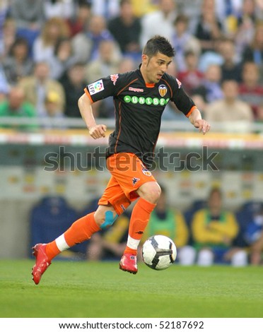 BARCELONA, SPAIN - MAY 1: David Villa of Valencia CF in action during a Spanish League match between RCD Espanyol and Valencia at the Estadi Cornella on May 1, 2010 in Barcelona, Spain