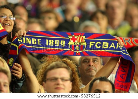 BARCELONA, SPAIN - MAY 16: FC Barcelona supporters enjoying during a Spanish League match between FC Barcelona and Valladolid at the Nou Camp Stadium on May 16, 2010 in Barcelona, Spain