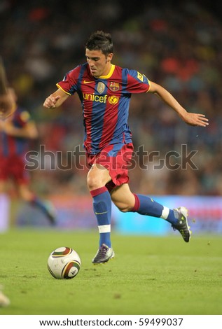 BARCELONA - AUGUST 21: David Villa of Barcelona during Supercup match between Barcelona vs Sevilla at the New Camp Stadium in Barcelona on August 21, 2010