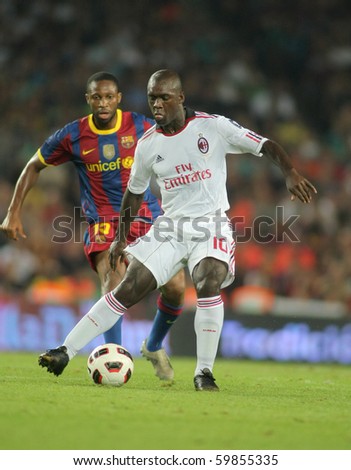 BARCELONA - AUGUST 25: Seedorf player of AC Milan in action during Trophy Joan Gamper match between FC Barcelona and AC Milan at Nou Camp Stadium on August 25, 2010 in Barcelona, Spain.