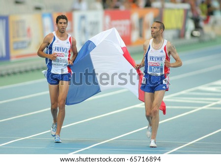 BARCELONA, SPAIN - AUGUST 01: Mekhissi-Benabbad(L) and Tahri(R) of France celebrate medals on 3000m steeplechase of the 20th European Athletics at the Olympic St. on August 1, 2010 in Barcelona, Spain
