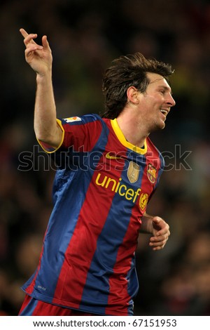 BARCELONA - DEC 12: Leo Messi of Barcelona celebrates goal during a Spanish League match between FC Barcelona and Real Sociedad at the Nou Camp Stadium on December 12, 2010 in Barcelona, Spain