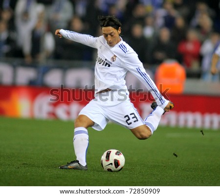 BARCELONA FEB 13 Mesut Ozil of Real Madrid during a spanish league match between Espanyol and Real Madrid at the Estadi Cornella on February 13 2011 in Barcelona Spain BARCELONA FEB 13 Mesut Ozil of Real Madrid during a spanish league match between Espanyol and Real Madrid at the Estadi Cornella on February 13 2011 in Barcelona Spain