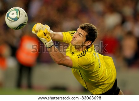 BARCELONA AUG 17 Iker Casillas of Real Madrid throws the ball during the Spanish Supercup football match between Barcelona vs Real Madrid at the New Camp Stadium in Barcelona Spain on August 17 2011 BARCELONA AUG 17 Iker Casillas of Real Madrid throws the ball during the Spanish Supercup football match between Barcelona vs Real Madrid at the New Camp Stadium in Barcelona Spain on August 17 2011