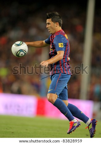 BARCELONA - AUG 17: David Villa of FC Barcelona during the Spanish Supercup football match against FC Barcelona at the New Camp Stadium on August 17, 2011 in Barcelona, Spain