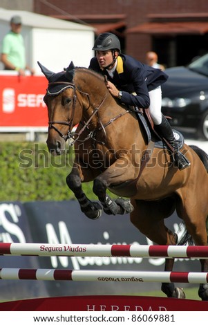 BARCELONA, SPAIN - SEPT, 23: Cassio Rivetti of Ukraine in action rides horse Verdi during the 100th CSIO event at the Real Club de Polo Barcelona on September 23, 2011 in Barcelona, Spain