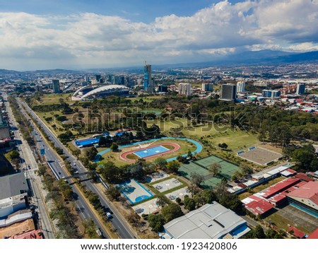 Beautiful aerial view of the City of San Jose Costa Rica, Its park Sabana, buildings at sunset