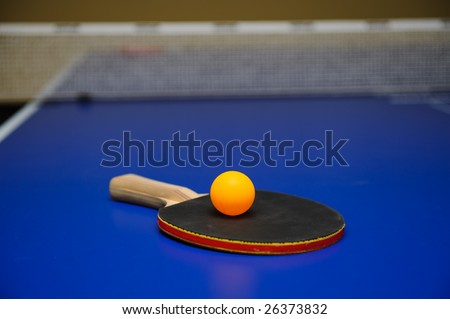Table tennis racket and ball