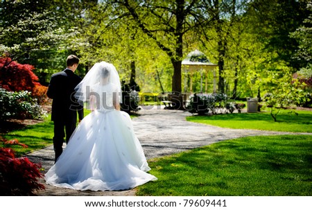 Bride and groom in the park