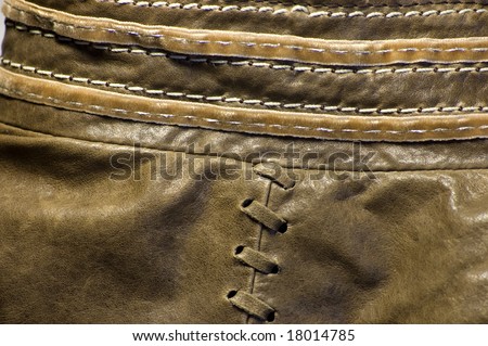 Brown leather and braids. Textured