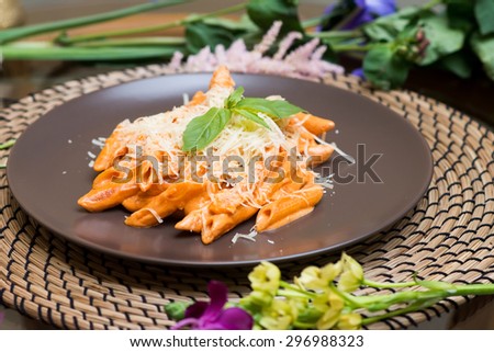 Pasta with red sauce. Penne funghi. Italian quisine