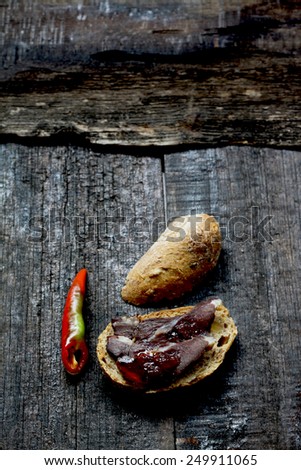 Smoked wild boar meat and  served  with chilli jam
