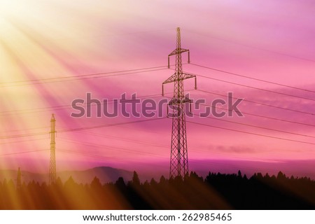 Electrical power lines. Electrical power and energy. Rays of light. Alternative energy