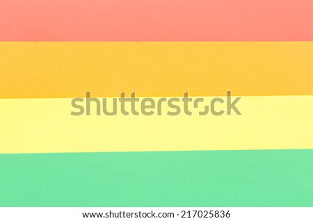 colored construction paper sheets arranged in horizontal stripes