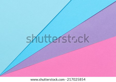 bluish construction paper sheets arranged diagonally