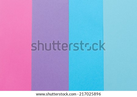 bluish construction paper sheets arranged vertically