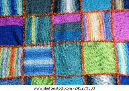 segments of a colorful handmade quilt blanket