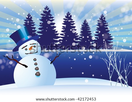 A snowman with blue top hat in the snow next to a tree lined lake with falling snow.