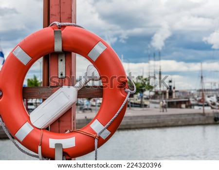 Life Ring in Harbor. Safety in sea.