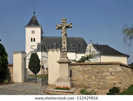 Zatcany at Brno, Czech Republic, stone cross at the Church of the Holy Trinity from the 11th century