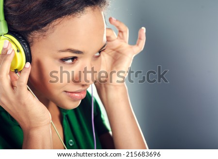 beautiful young black woman with headphones