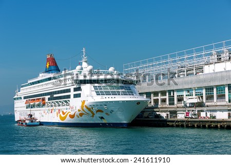 Hong Kong, China - December 30, 2014 : Star Cruises Pisces docked at Victoria Harbor, Hong Kong. Hongkong is a major tourist city in Asia,More than 40000000 visitors a year.