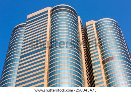 HONG KONG - April 9 2014: Front of the Two Exchange Square in Central district. Hong Kong Stock Exchange (SEHK) is located in the this building. It is Asia\'s second largest stock exchange.