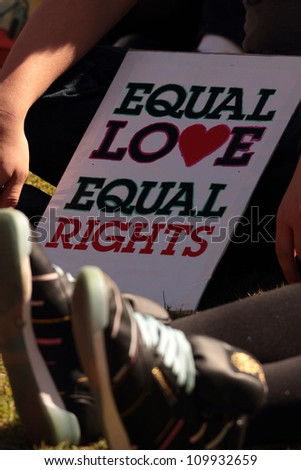 BRISBANE, QLD AUSTRALIA - AUGUST 11 : equal love sign amongst crowd on August 11 2012  in Brisbane, Australia  Equal Love is a gay rights group supporting gay marriage