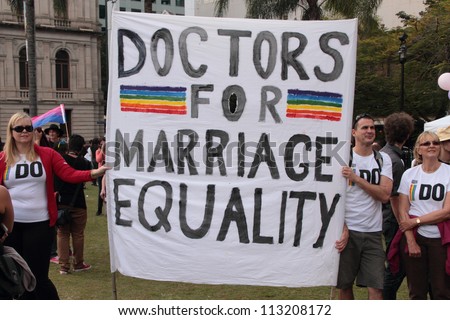 BRISBANE, QLD AUSTRALIA - AUGUST 11 : Unidentified people holding gay marriage support banner at protest on August 11 2012  in Brisbane, Australia