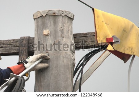 linesman rewiring electricty pole brisbane queensland brisbane australia