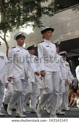 BRISBANE, AUSTRALIA - APRIL 25 : Naval personnel  march along the route during Anzac day commemorations  April 25, 2013 in Brisbane, Australia