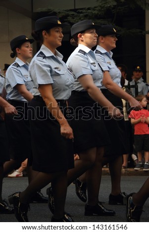 BRISBANE, AUSTRALIA - APRIL 25 : Airforce personnel  march along the route during Anzac day commemorations  April 25, 2013 in Brisbane, Australia