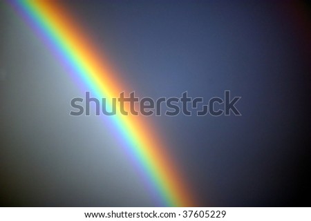 bright rainbow across the heavens showing all the colors