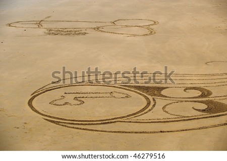 stock photo male penis graffiti drawn into beach sand by pranksters