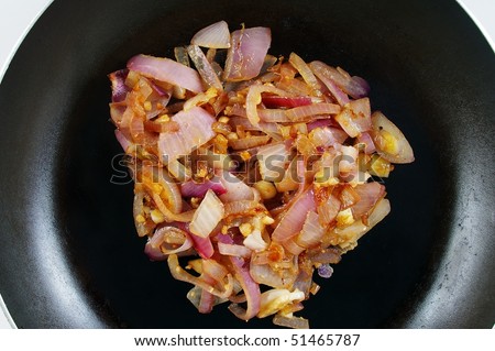 caramelised spanish onion and garlic in frying pan
