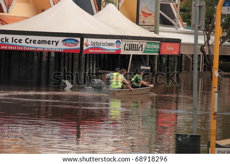 BRISBANE, AUSTRALIA - JAN 13 : Flooded  Brisbane auchenflower area police and army patrol January 13, 2011 in Brisbane, Australia