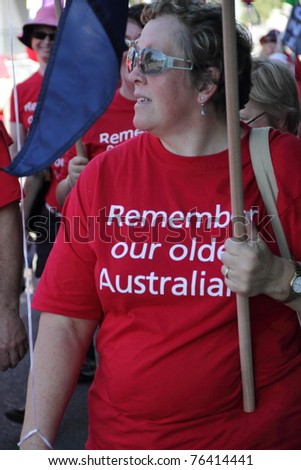 BRISBANE, AUSTRALIA - MAY 2 : An unidentified woman marches for equal rights for older workers in a  Labour Day march on May 2, 2011 in Brisbane, Australia