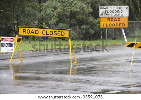 BRISBANE, AUSTRALIA - JAN 25 : One year on Brisbane flooding again, old bay road closed Burpengay January 25, 2012 in Brisbane, Australia