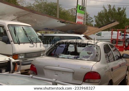 BRISBANE, AUSTRALIA - NOVEMBER 28 : Damage to car yard from super cell hail storm area declared disaster on November 28, 2014 in Brisbane, Australia