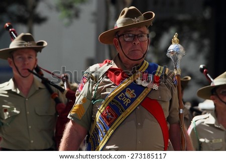 BRISBANE, AUSTRALIA - APRIL 25 : Military band performing along march during Anzac day centenary commemorations April 25, 2015 in Brisbane, Australia
