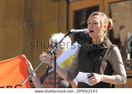 BRISBANE, AUSTRALIA - JUNE 20 :Greens Senator Larissa Waters speaking at World Refugee Rally June 20, 2015 in Brisbane, Australia