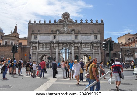 ROME, ITALY - JUNE 24, 2014: Tourists visiting the Piazza del Popolo meaning People Square or Poplar Square