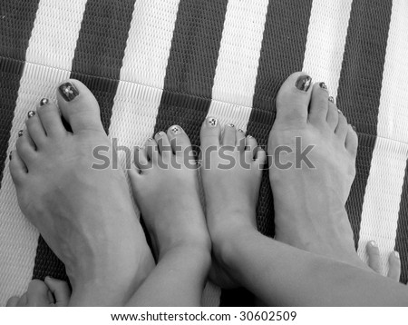 Mother and daughter feet