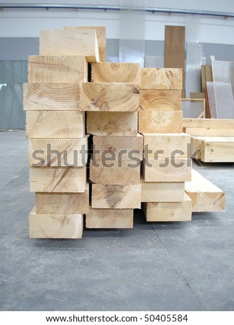 A pile of wood plank boards in a carpentry factory