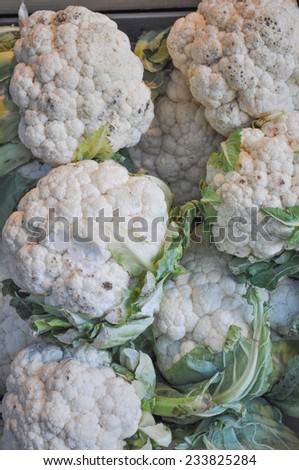 Cauliflowers vegetables in crate on a market shelf