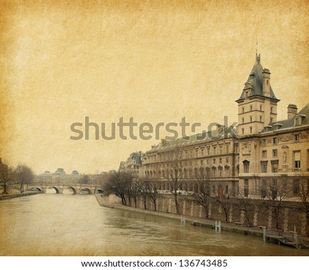The Seine near the Pont Neuf,  Paris, France. Photo in retro style. Paper texture.