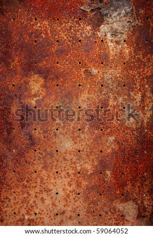 old metal texture with round holes