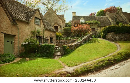 Bibury. Cotswold stone cottages in  beautiful spring day.  England, UK.